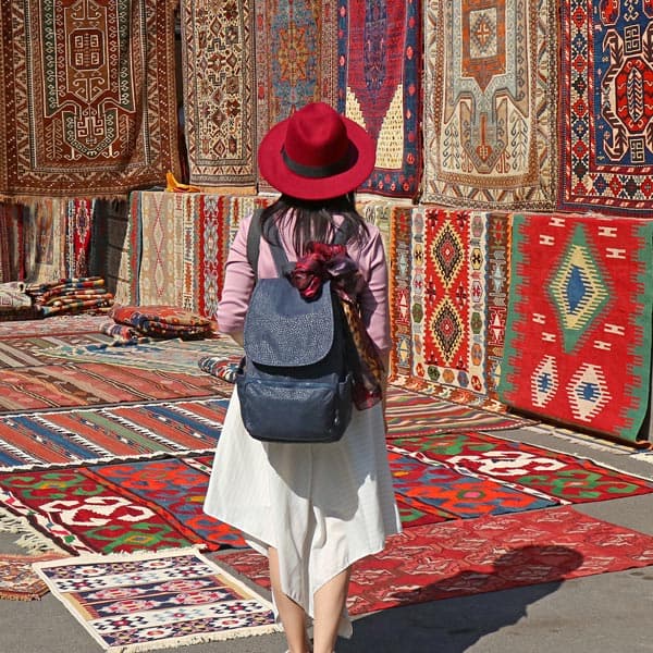 Customer browsing our rug collection